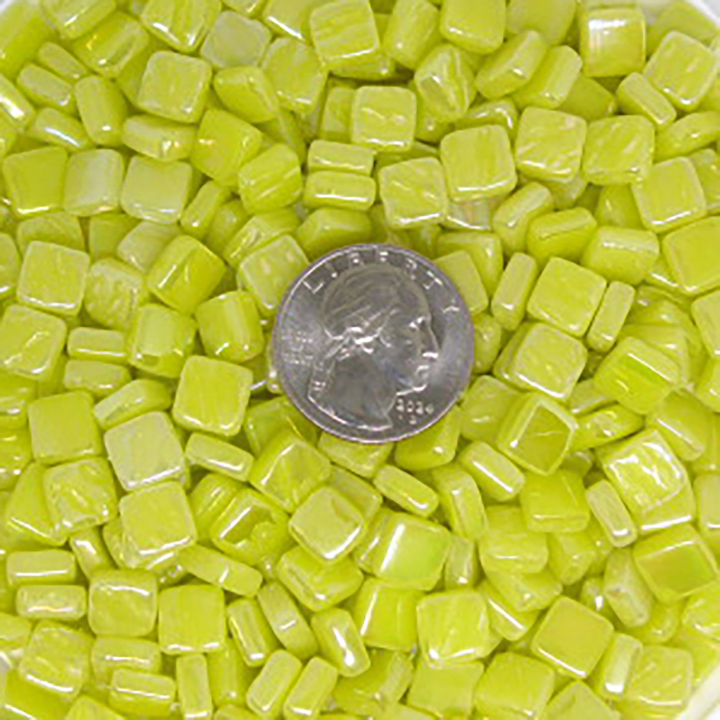 Vibrant yellow mosaic tiles from Kismet Mosaic's, showcasing iridized, square glass tiles ideal for your mosaic projects.