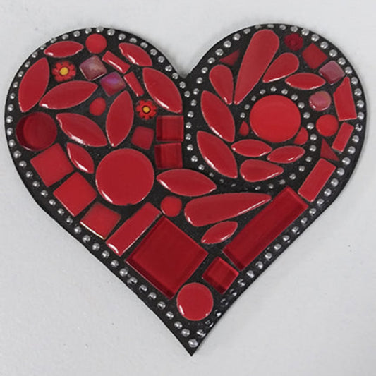 A heart-shaped mosaic made of red tiles .
