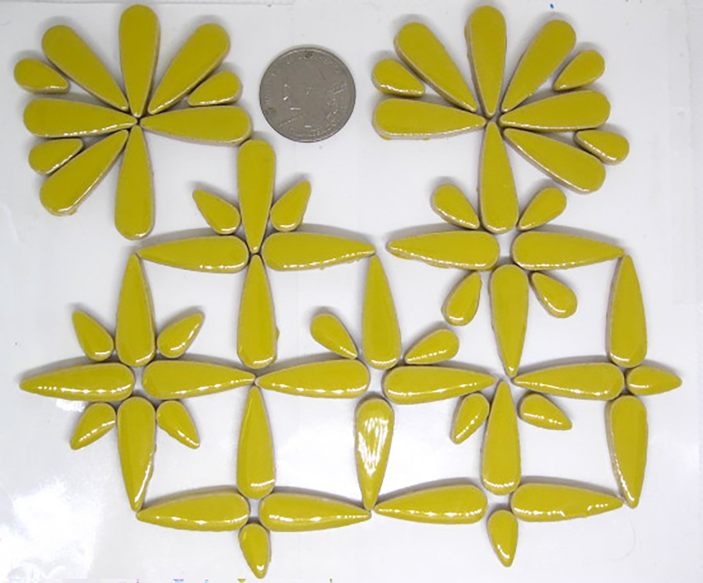 2 oz Yellow ceramic teardrops with a quarter for scale