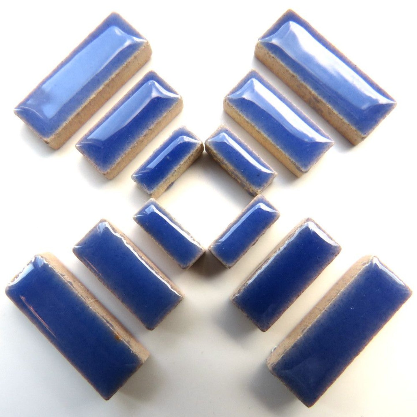 Blue rectangular ceramic tiles on a white background