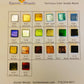 A sample board displaying a variety of foil-icious mosaic tiles in different colors.