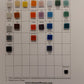 Color swatch chart for Kismet Recycled Glass mosaic tiles with various color samples. matte finish