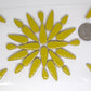 2 oz Yellow ceramic teardrops with a quarter for scale