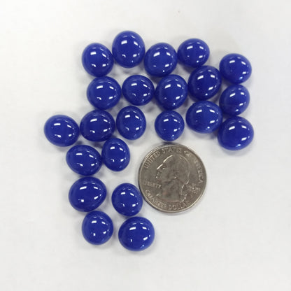 A collection of blue glass mini gems with a high-gloss finish.