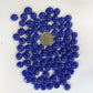A collection of blue glass mini gems with a high-gloss finish.